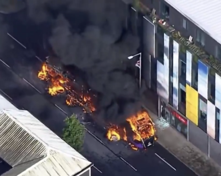 Bus Set Ablaze Amid Protests After Sudanese Migrant Charged