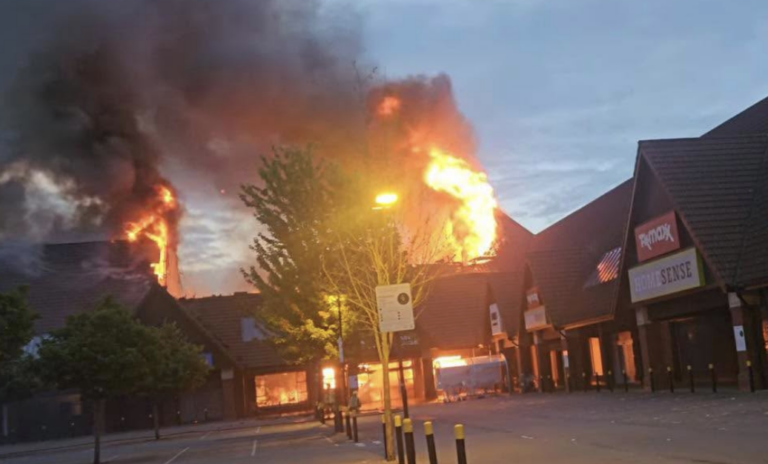 Massive Fire Tears Through Shopping Centre Roof
